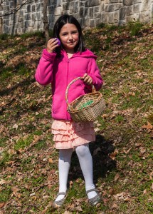 Successful "hunter" holds up one of her finds (Photo by Michael Mitchell)