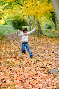 Playing in Tregaron's many leaves (Photo by Jamie Davis Smith)